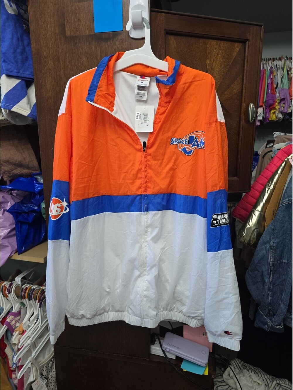 Medium men's brand new space jam windbreaker jacket.Item 154G1